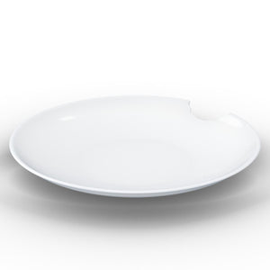 Set of two premium porcelain deep plates in white with a 'bite mark' cutout at the edge. Dishwasher and microwave safes plate with a 9.4 inch diameter. From the TASSEN product family of fun dishware by FIFTYEIGHT Products. Made in Germany according to environmental standards.