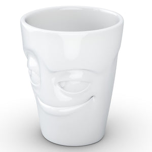 Coffee mug with 'impish' facial expression and 11 oz capacity. From the TASSEN product family of fun dishware by FIFTYEIGHT Products. Tall coffee cup with handle in white, crafted from quality porcelain.