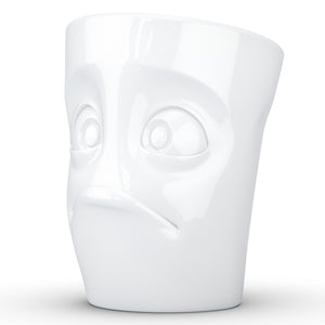 Coffee mug with 'baffled' facial expression and 11 oz capacity. From the TASSEN product family of fun dishware by FIFTYEIGHT Products. Tall coffee cup with handle in white, crafted from quality porcelain.