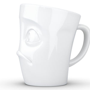 Coffee mug with 'baffled' facial expression and 11 oz capacity. From the TASSEN product family of fun dishware by FIFTYEIGHT Products. Tall coffee cup with handle in white, crafted from quality porcelain.
