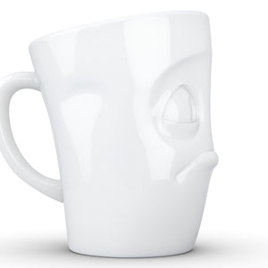 Coffee mug with 'baffled' facial expression and 11 oz capacity. From the TASSEN product family of fun dishware by FIFTYEIGHT Products. Tall coffee cup with handle in white, crafted from quality porcelain.