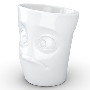 Coffee mug with 'baffled' facial expression and 11 oz capacity. From the TASSEN product family of fun dishware by FIFTYEIGHT Products. Tall coffee cup with handle in white, crafted from quality porcelain.