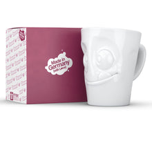 Load image into Gallery viewer, Coffee mug with &#39;tasty&#39; facial expression and 11 oz capacity. From the TASSEN product family of fun dishware by FIFTYEIGHT Products. Tall coffee cup with handle in white, crafted from quality porcelain.
