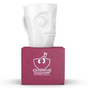 Coffee mug with 'tasty' facial expression and 11 oz capacity. From the TASSEN product family of fun dishware by FIFTYEIGHT Products. Tall coffee cup with handle in white, crafted from quality porcelain.