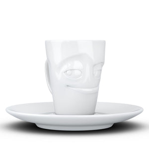 Espresso cup with 'impish' facial expression and 2.7 oz capacity. From the TASSEN product family of fun dishware by FIFTYEIGHT Products. Espresso mug with matching saucer crafted from quality porcelain.