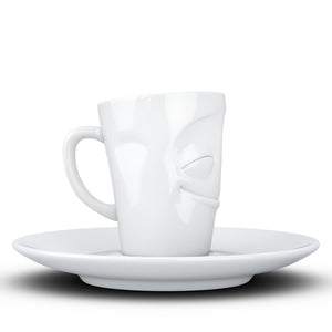 Espresso cup with 'cheery' facial expression and 2.7 oz capacity. From the TASSEN product family of fun dishware by FIFTYEIGHT Products. Espresso mug with matching saucer crafted from quality porcelain.