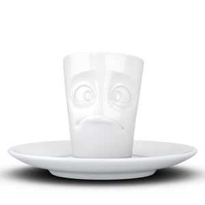 Espresso cup with 'baffled' facial expression and 2.7 oz capacity. From the TASSEN product family of fun dishware by FIFTYEIGHT Products. Espresso mug with matching saucer crafted from quality porcelain.