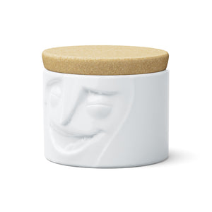 Quality porcelain storage jar with 30 oz. capacity and a 'cheerful' facial expression. Closes securely with a natural cork lid. Dishwasher and microwave-safe (except for cork lid).From the TASSEN product family of fun dishware by FIFTYEIGHT Products. Made in Germany according to environmental standards.standards.