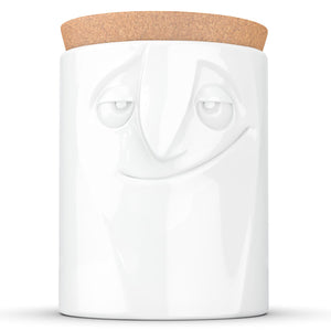 Quality porcelain storage jar with 57 oz. capacity and a 'charming' facial expression. Closes securely with a natural cork lid. Dishwasher and microwave-safe (except for cork lid).From the TASSEN product family of fun dishware by FIFTYEIGHT Products. Made in Germany according to environmental standards.standards.