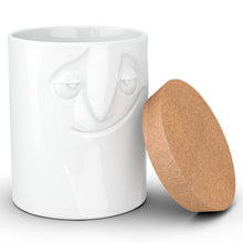 Load image into Gallery viewer, Quality porcelain storage jar with 57 oz. capacity and a &#39;charming&#39; facial expression. Closes securely with a natural cork lid. Dishwasher and microwave-safe (except for cork lid).From the TASSEN product family of fun dishware by FIFTYEIGHT Products. Made in Germany according to environmental standards.standards.
