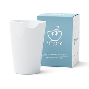 Premium porcelain coffee mug with a 'bite' mark and no handle from the TASSEN product family of fun dishware by FIFTYEIGHT Products. Offers 13.5 oz capacity for serving coffee, tea, latte, matcha, soup and more. Dishwasher and microwave safe.