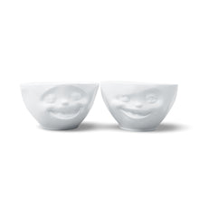 Load image into Gallery viewer, Set of two 6.5 oz. bowls in white from the TASSEN product family featuring sculpted Laughing and Winking faces.
