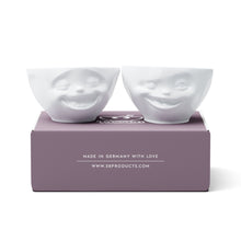 Load image into Gallery viewer, Set of two 6.5 oz. bowls in white from the TASSEN product family featuring sculpted Laughing and Winking faces.
