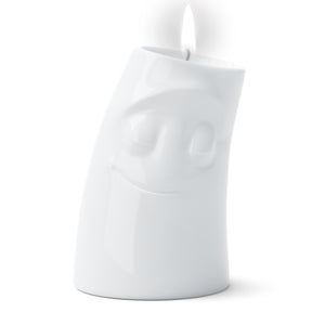 Exclusive designer candle holder with CUDDLY facial expression. Stands at 4.4 inches tall on a footed base and fits a tea light or LED light. From the TASSEN product family of fun dishware by FIFTYEIGHT Products. Made in Germany according to environmental standards.