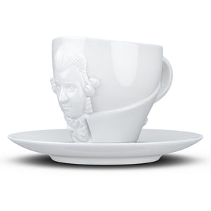 Premium porcelain coffee cup with saucer in white with sculpted Wolfgang Amadeus Mozart face. Dishwasher and microwave safe cup at 8.7 oz capacity. From the TALENT product family of cups dedicated to creative geniuses by FIFTYEIGHT Products.