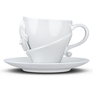 Premium porcelain coffee cup with saucer in white with sculpted Wolfgang Amadeus Mozart face. Dishwasher and microwave safe cup at 8.7 oz capacity. From the TALENT product family of cups dedicated to creative geniuses by FIFTYEIGHT Products.