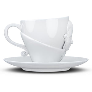 Premium porcelain coffee cup with saucer in white with sculpted Wolfgang Amadeus Mozart face. Dishwasher and microwave safe cup at 8.7 oz capacity. From the TALENT product family of cups dedicated to creative geniuses by FIFTYEIGHT Products.