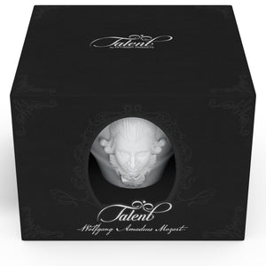 Premium porcelain coffee cup with saucer in white with sculpted Wolfgang Amadeus Mozart face. Dishwasher and microwave safe cup at 8.7 oz capacity. From the TALENT product family of cups dedicated to creative geniuses by FIFTYEIGHT Products.