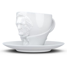 Load image into Gallery viewer, Premium porcelain coffee cup with saucer in white with sculpted Richard Wagner face. Dishwasher and microwave safe cup at 8.7 oz capacity. From the TALENT product family of cups dedicated to creative geniuses by FIFTYEIGHT Products.
