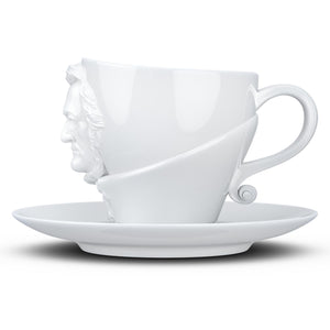 Premium porcelain coffee cup with saucer in white with sculpted Richard Wagner face. Dishwasher and microwave safe cup at 8.7 oz capacity. From the TALENT product family of cups dedicated to creative geniuses by FIFTYEIGHT Products.