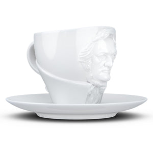 Premium porcelain coffee cup with saucer in white with sculpted Richard Wagner face. Dishwasher and microwave safe cup at 8.7 oz capacity. From the TALENT product family of cups dedicated to creative geniuses by FIFTYEIGHT Products.