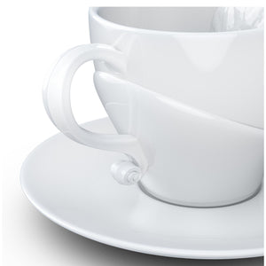Premium porcelain coffee cup with saucer in white with sculpted Richard Wagner face. Dishwasher and microwave safe cup at 8.7 oz capacity. From the TALENT product family of cups dedicated to creative geniuses by FIFTYEIGHT Products.